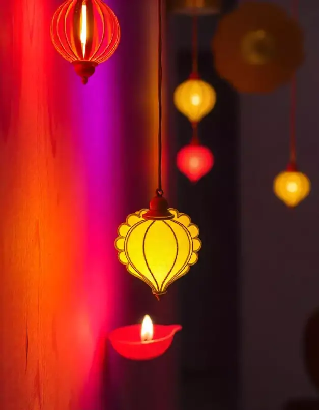 Colorful Diwali hanging lanterns with diya in a festive setting | Festive Diwali Lantern and Diya Décor | Diwali Decor Ideas | Decorations Guru