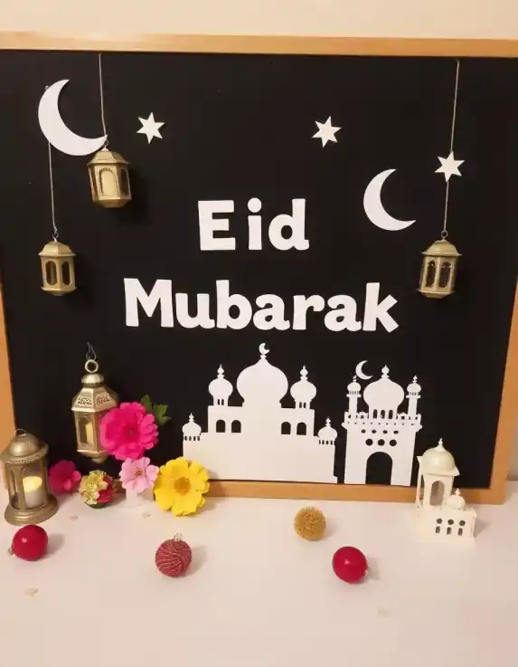 Beautiful Eid Mubarak board decoration with mosque cutouts, lanterns, and floral accents | Eid Mubarak Decorative Board | Festival Decorations | Decorations Guru