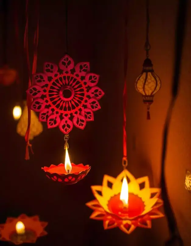 Beautiful hanging diyas and lanterns lighting up the Diwali celebration. | Hanging Diya and Lantern Decor | Festival Lighting & Diwali Décor | Decorations Guru