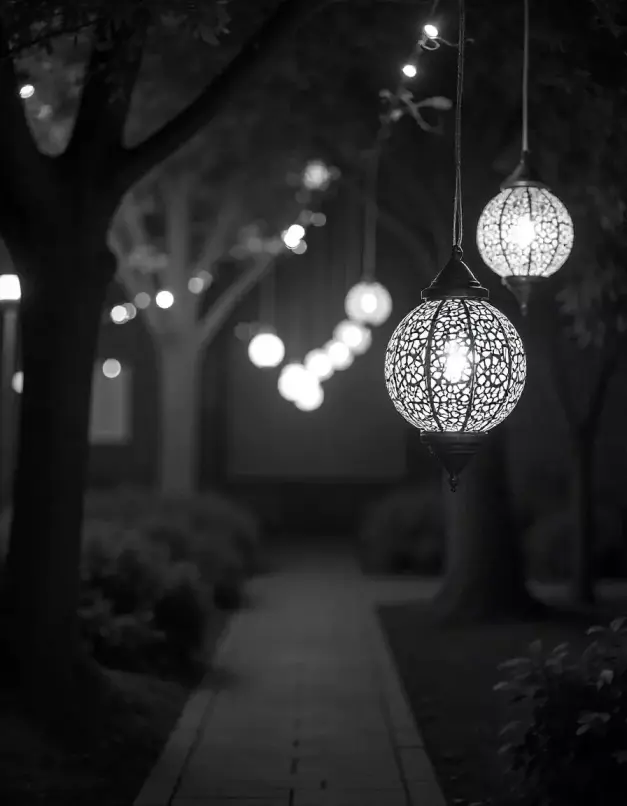 Intricately designed hanging lanterns illuminating a festive outdoor pathway. | Lantern Pathway Decoration | Festival Outdoor Decoration Ideas | Decorations Guru