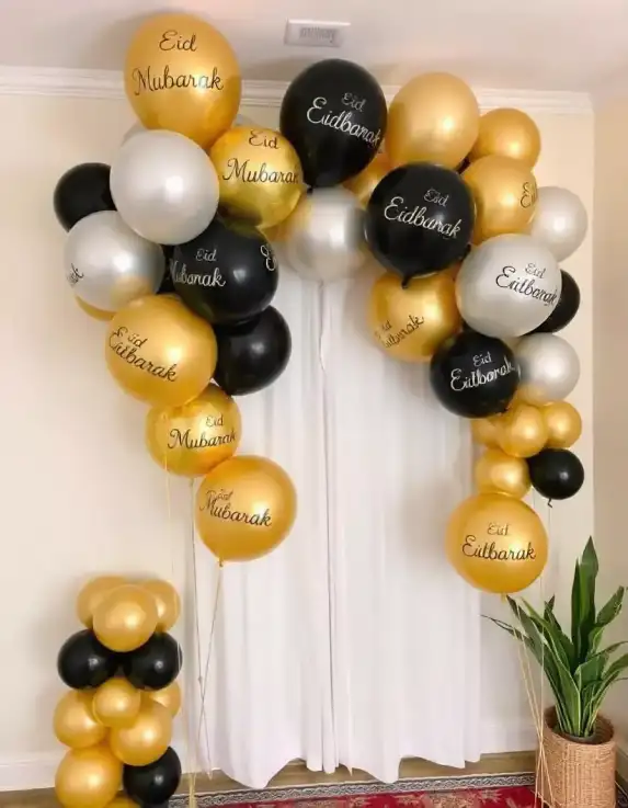 Eid Mubarak balloon arch with gold, black, and silver balloons | Elegant Eid Mubarak Balloon Arch Decoration | Festive Balloon Décor Ideas | Decorations Guru