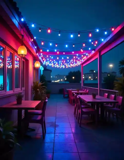 Rooftop decorated with colorful string lights for Diwali night celebration | Vibrant Rooftop Lighting for Diwali Night | Outdoor Diwali Decorations | Decorations Guru